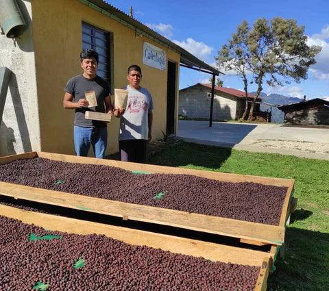 Farmers from the the Chiapas region bordering Guatemala holding THE BARN coffee bags